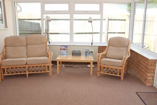 Long Acres holiday cottage conservatory seating